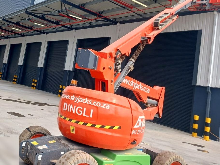 Commercial warehouse electrical works with boom lift